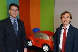 Drew and Eli pose with their invention